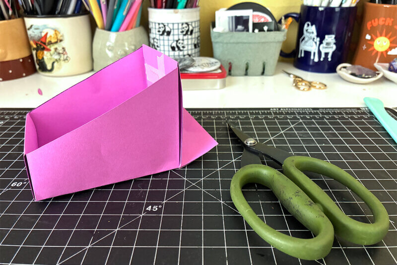 The zine holder with an extra paper tail